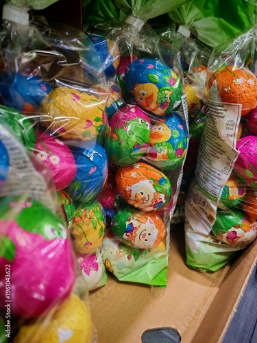 Lyon,France-March 26,2026: Chocolate eggs at colourful package are at the packet on the shop shelf. Present for Easter