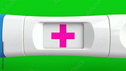 White and blue test stick with bright pink plus symbol on green backdrop
