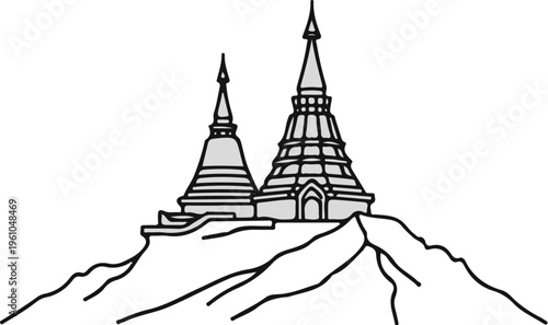 Two pagodas rise majestically atop a rugged mountain peak