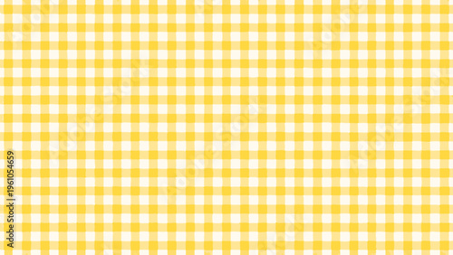 A vibrant repeating pattern of yellow and white checkered squares