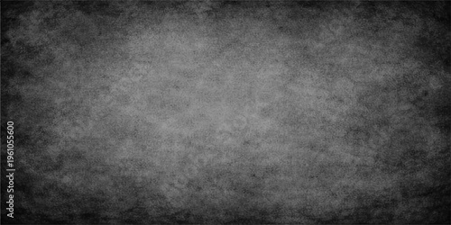 A dark vintage grunge paper texture background featuring a rough aged gray concrete wall pattern and a dirty black stone surface backdrop for a blank textured design