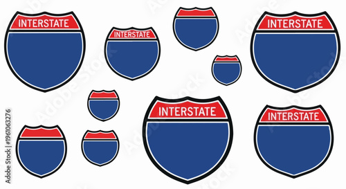 Multiple interstate highway signs of varying sizes, all blank
