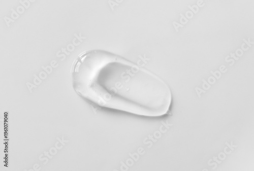 Clear transparent skin care facial serum moisturizer smear beauty product sample. Shampoo, skincare gel