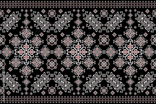 Seamless ethnic geometric pattern with repeating diamond and floral-inspired motifs in warm orange, black, beige, and white. Bold decorative design suitable for textiles, wallpapers, and surface decor