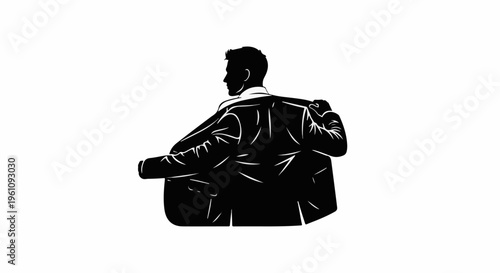 Silhouette of a man in a suit adjusting his jacket, back turned