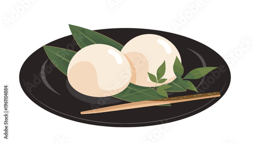 Traditional japanese mochi dumplings served on a black plate with bamboo leaves and a wooden skewer for food and culture articles.