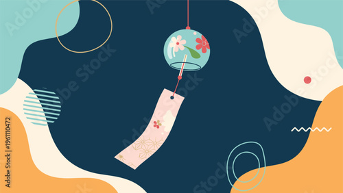 Traditional Japanese glass wind chime decorated with flowers hanging against an abstract colorful background with wavy shapes.