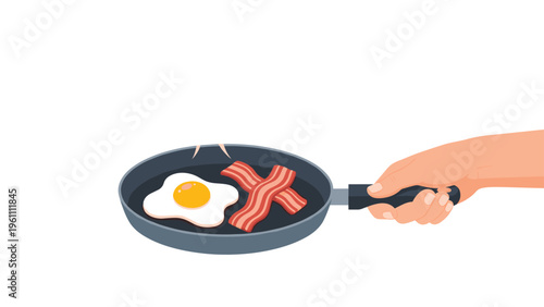 Hand holding a frying pan with a fried egg and two strips of bacon cooking inside isolated on a plain white background for breakfast.