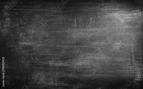 Chalk rubbing texture  on blackboard background. Texture of chalk on blank black blackboard or chalkboard background. School education, dark wall backdrop, template for learning board concept.