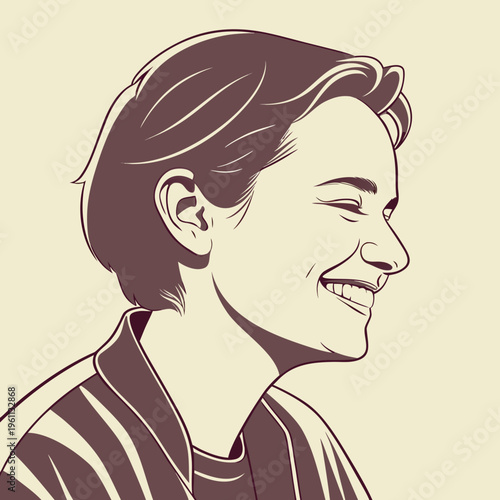 A smiling young man with short hair