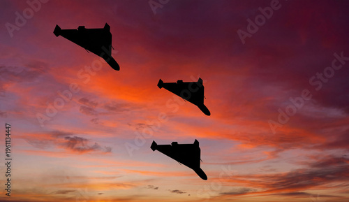 Shahed Kamikaze Drones Silhouetted Against Sunset