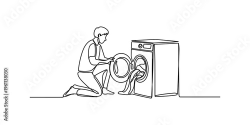 Continuous line drawing of a young man kneeling to put clothes into a washing machine.