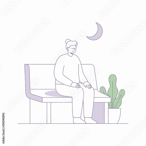 Elderly woman sitting on a bench at night.