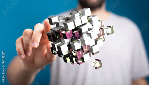 Abstract concept of technology, data visualization, and connection. A man's hand interacting with a 3D geometric cube st