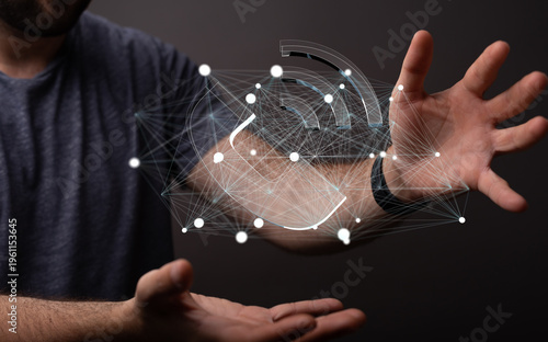 A person extending a hand towards an abstract network, symbolizing digital connectivity, technology and innovation.  Con