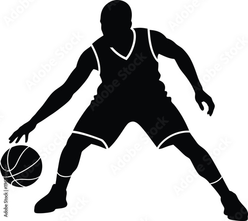 Silhouette of a basketball player in action
