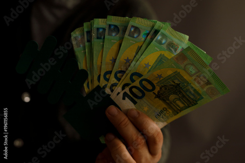 Close-up of a person displa...