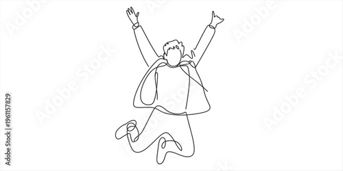 man jumping in the air with arms raised in joy and freedom