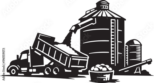 Grain silo filling from harvest truck.