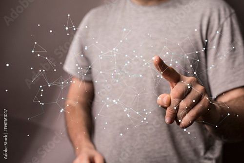Close-up of a hand interacting with a digital network, representing technology, connection, and data transfer.