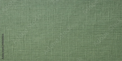 Green fabric canvas texture with a rough natural linen pattern provides a vintage grunge textile material backdrop for design surface wallpaper
