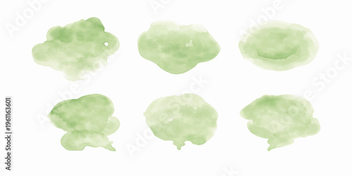 A collection of green watercolor paint brush strokes and splash elements creates a textured art design featuring various hand-drawn shapes and grunge stain patterns on a paper vector illustration