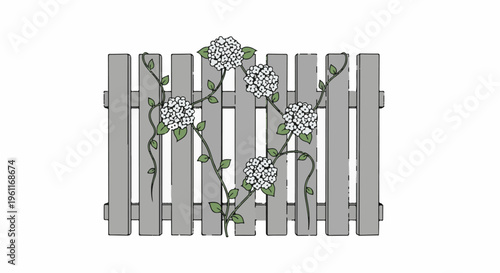 White flowers cascade over a grey picket fence