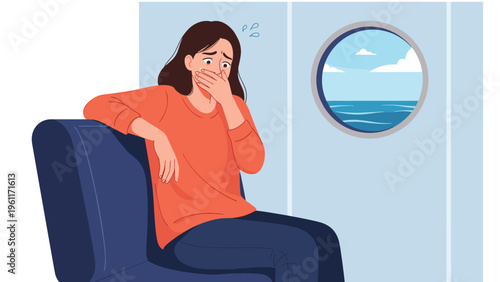 Unwell woman sitting on a blue chair inside a ship and looking nauseous while gazing out of a porthole window at the ocean.