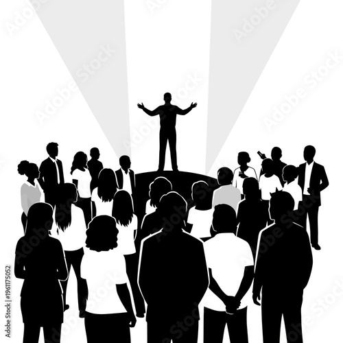 Silhouette of man addressing crowd.