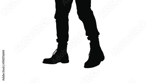Lower body silhouette of a person wearing tall boots and trousers standing on a white surface.