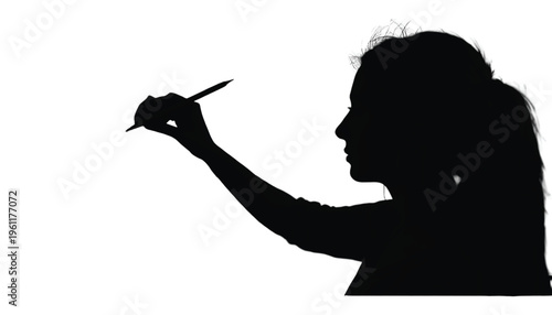 Silhouette profile of a female artist holding a thin drawing tool against a white background for creation.