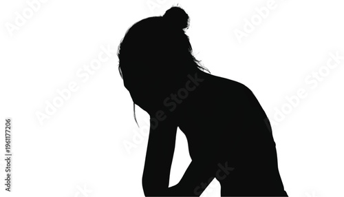 Black silhouette of a sad female figure with hair in a bun resting her head on her hand against white.