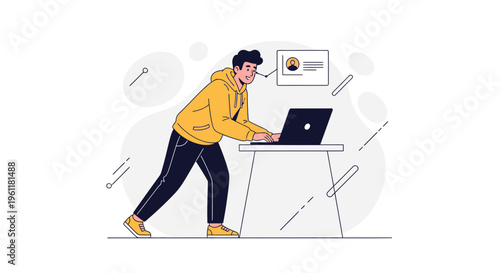 Young man in yellow hoodie working on laptop at standing desk, data visualization