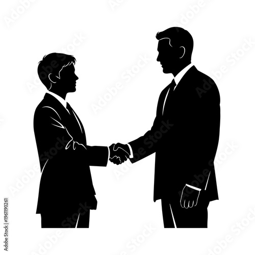 Two businessmen shaking hands in agreement.