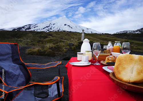 Breakfast with view at the volcano Villarrica in the National Park, Pucon region, Chile