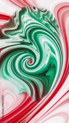 Red liquid swirling in white liquid, abstract background