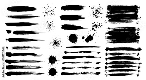 Brush strokes set with black ink splatters and grunge effects on white background featuring artistic, drawing, painting with abstract and