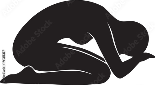 Abstract silhouette of person curled up in a fetal position.