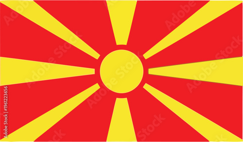 Flag of the republic of macedonia featuring a sunburst design and golden emblem