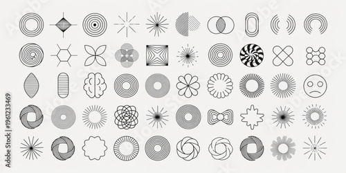 Various geometric shapes are arranged in rows on a plain surface for design.