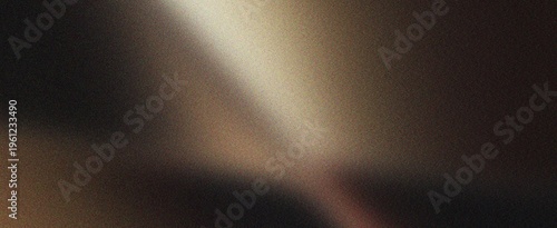 Photos Dark moody light flare background with grainy texture and warm sepia tones for artistic design