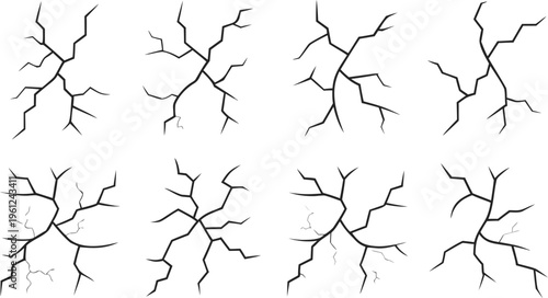 Black crack and fracture line sets on white background