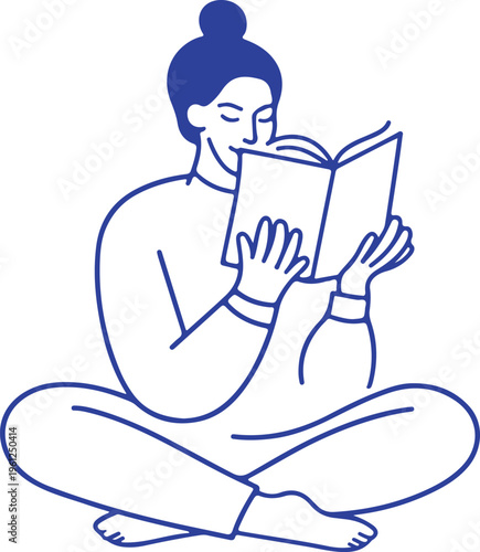 Woman with a bun reading an open book in a relaxed pose