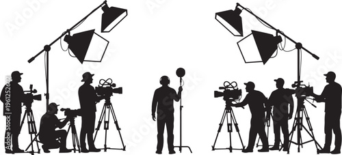Silhouettes of professional film crew and camera operators in a studio