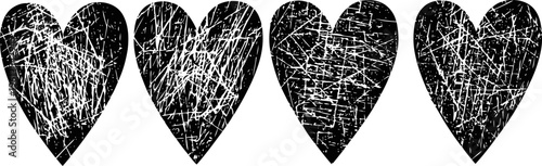 Four black grunge hearts with distressed scratch texture isolated on white background