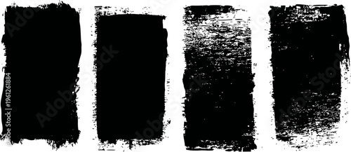 set of four black grunge paint brush strokes with rough, textured edges on white background