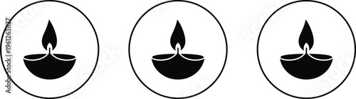 Three black tea light candles in oval frames