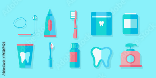 Colorful dental hygiene products arranged in a flat lay composition