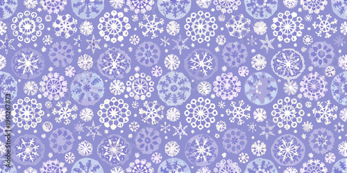 A seamless pattern of delicate white snowflakes on a lavender background