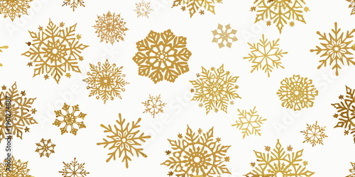 Golden snowflakes create a seamless festive winter pattern on white